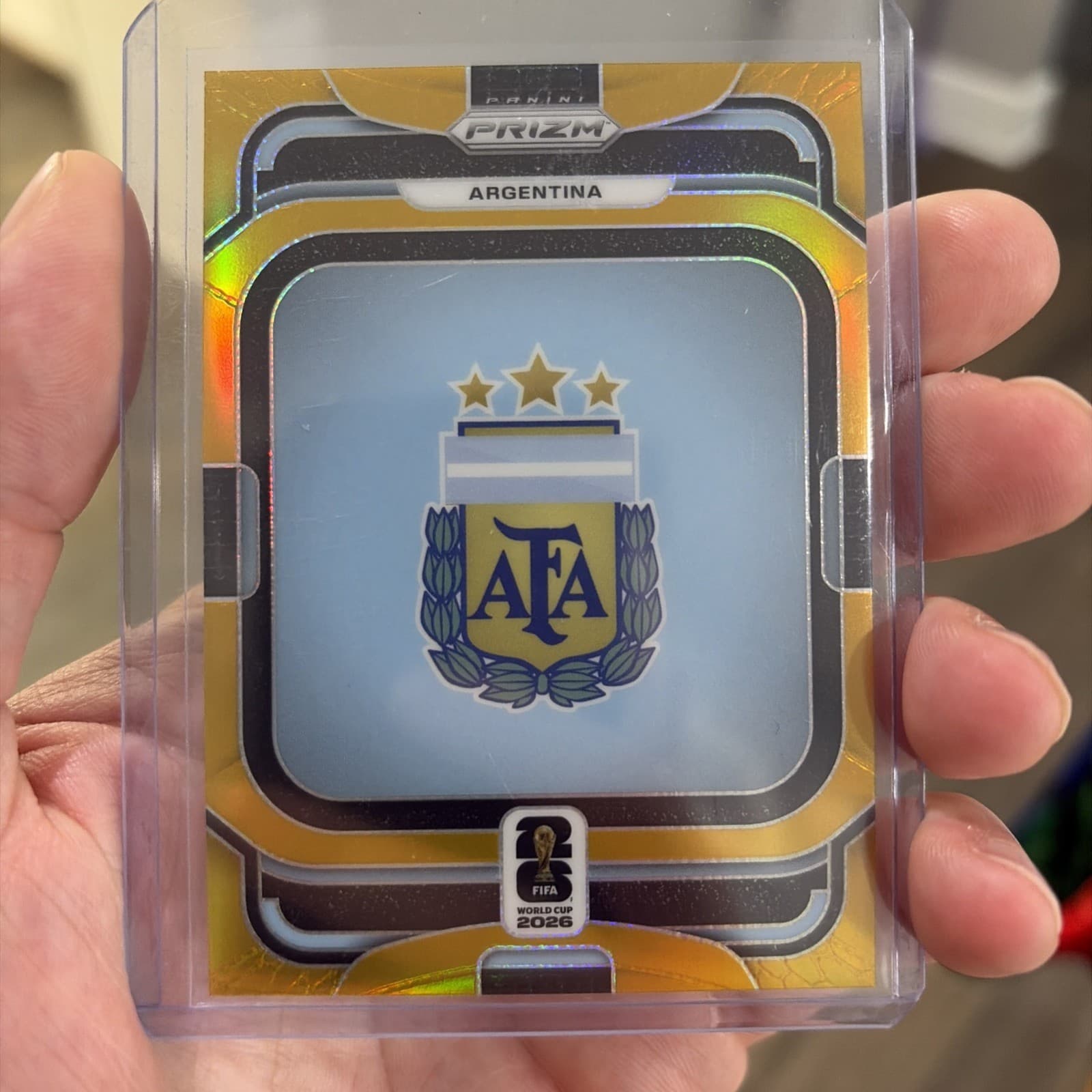 2026 Panini Prizm FIFA World Cup Argentina Team Badges Gold SSP Case HIT #3 3/10
